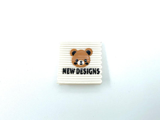 Rubber Label "Teddy" Creme Weiß