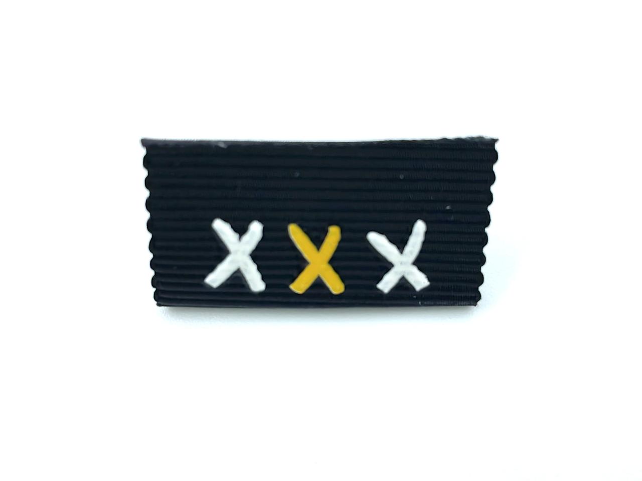 Rubber Label "XXX"