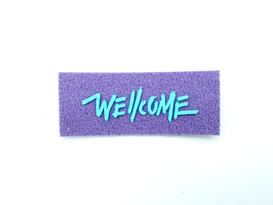 Label "Wellcome" Lila Hellblau