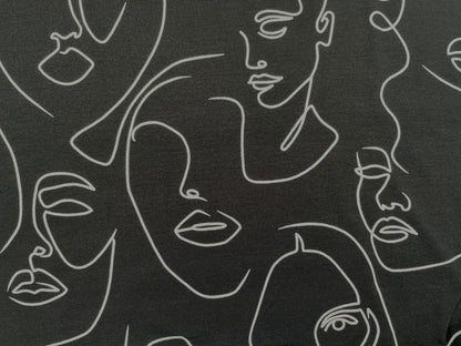 Tencel Jersey "Faces" Schwarz Reststück 120cm x 150cm
